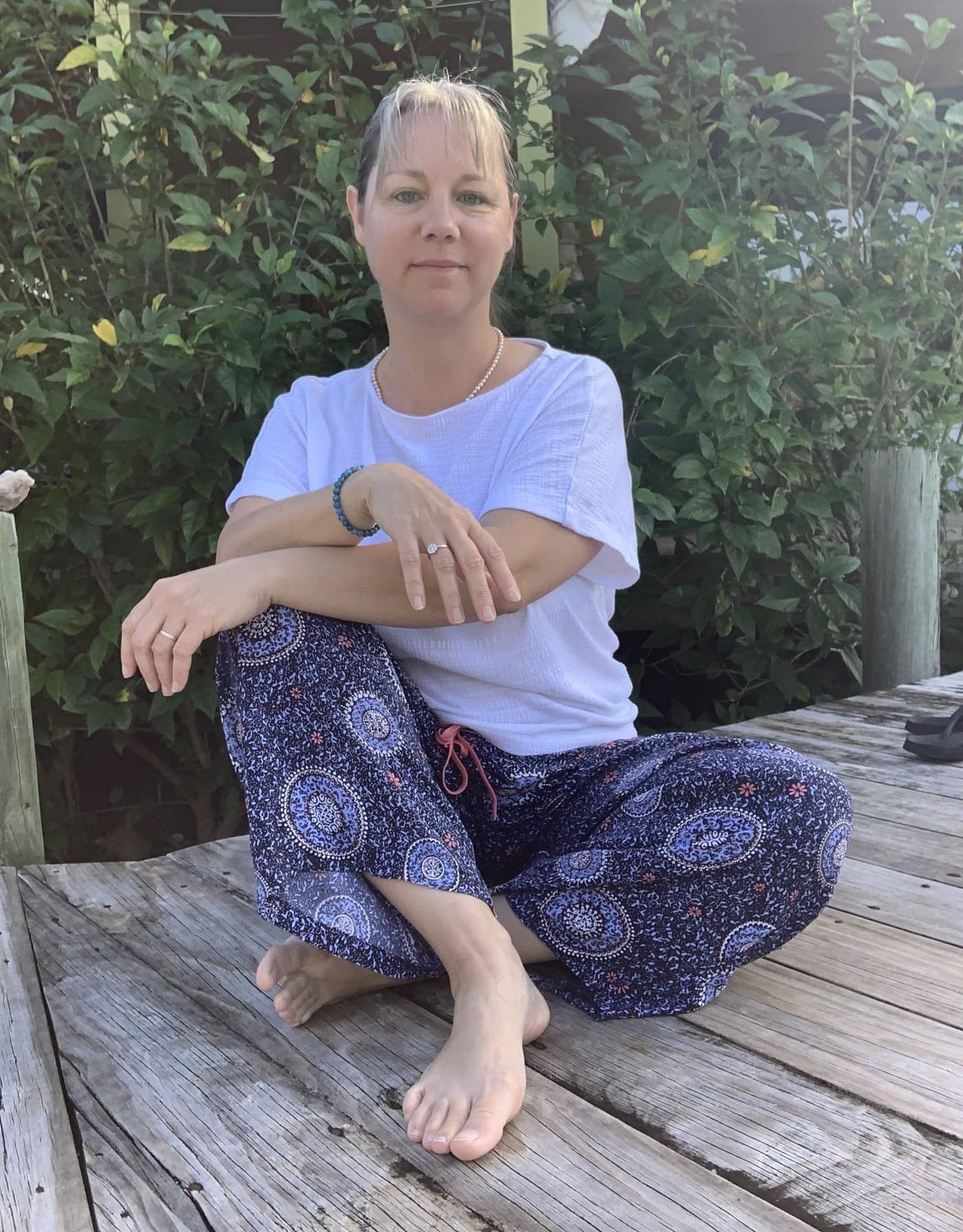 Annabelle Leray, holistic therapist and wellbeing coach in Adelaide, seated in meditation